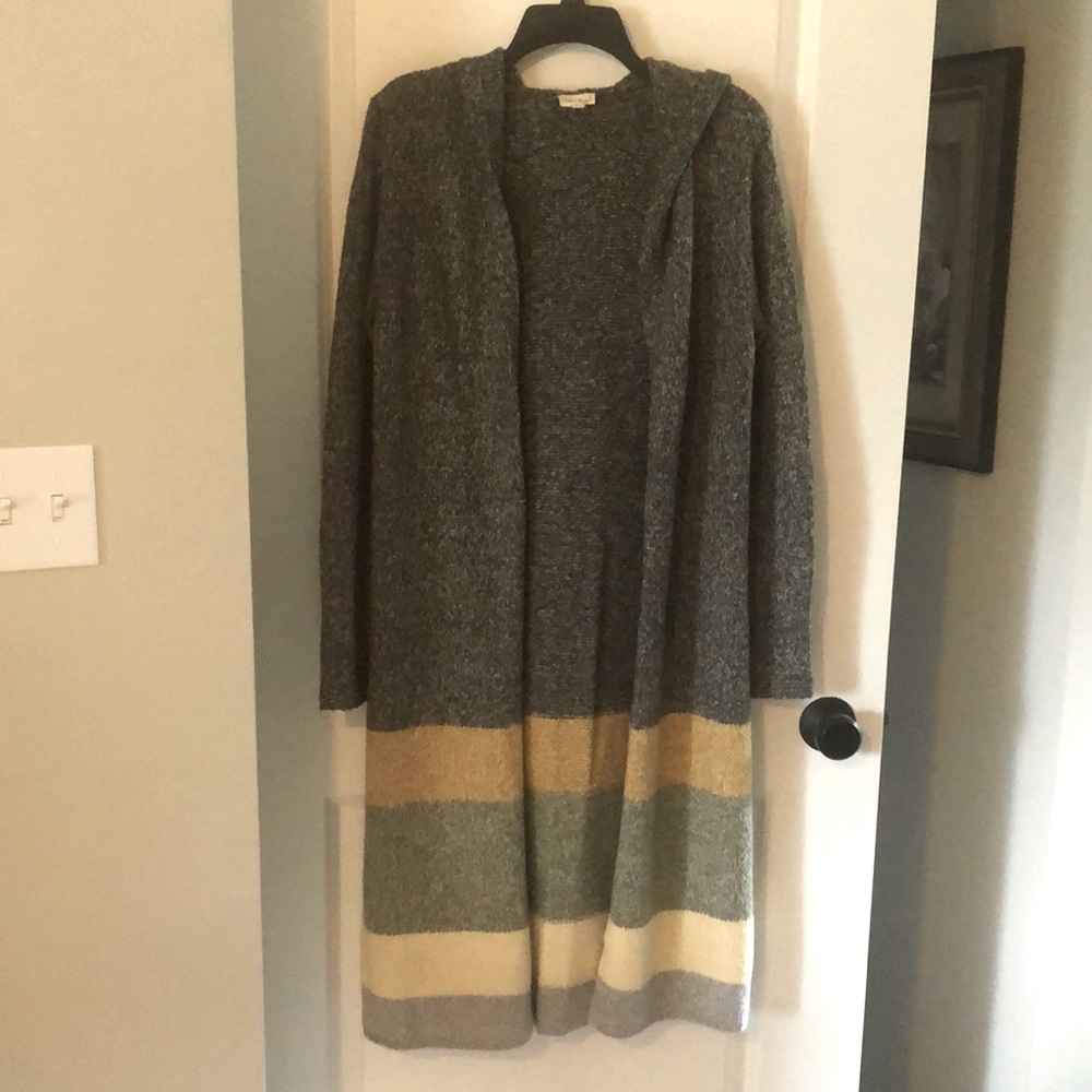 Cardigan, shin length with hood.